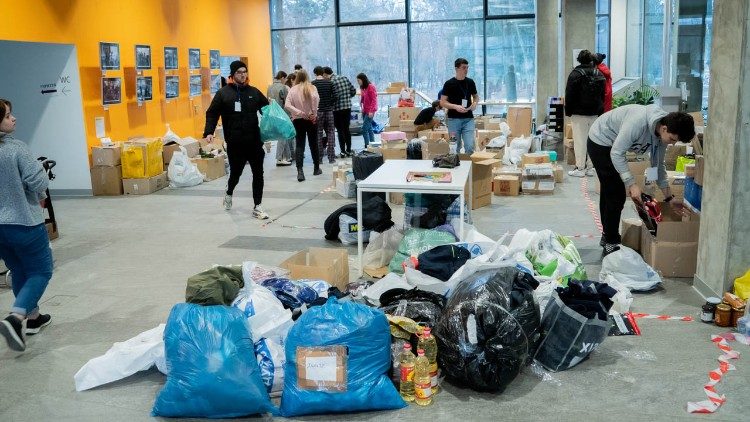 Students at the Ukrainian Catholic University of Lviv gather supplies for refugees