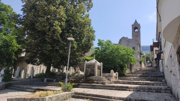 The remains of a bombed church a few steps from a mosque