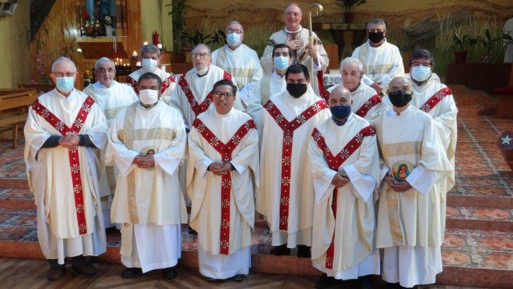 Bishop Infanti della Mora in Coyhaique Cathedral with the clergy of Aisèn