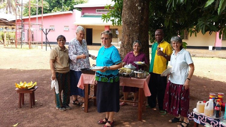 Sister Margaret with other sisters having dinner together
