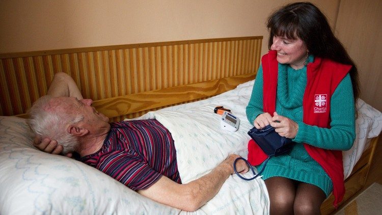 A Caritas member involved in caring for the elderly