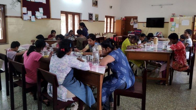 Cottolengo's residents share a meal together
