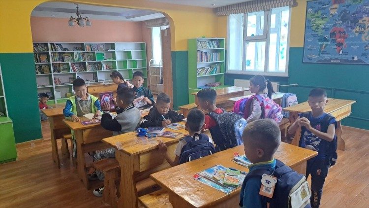 Children at their desks at the Centre