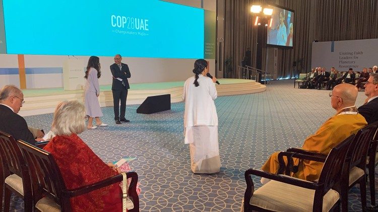 A participant speaks at the Global Faith Summit